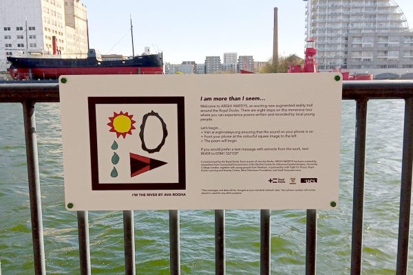 Photograph showing the installed sign with an AR marker designed by Ava Rogha for her poem titled I'm the River